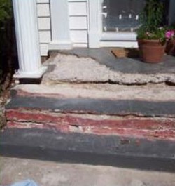 Below-grade concrete slab prepared for waterproof floor coating