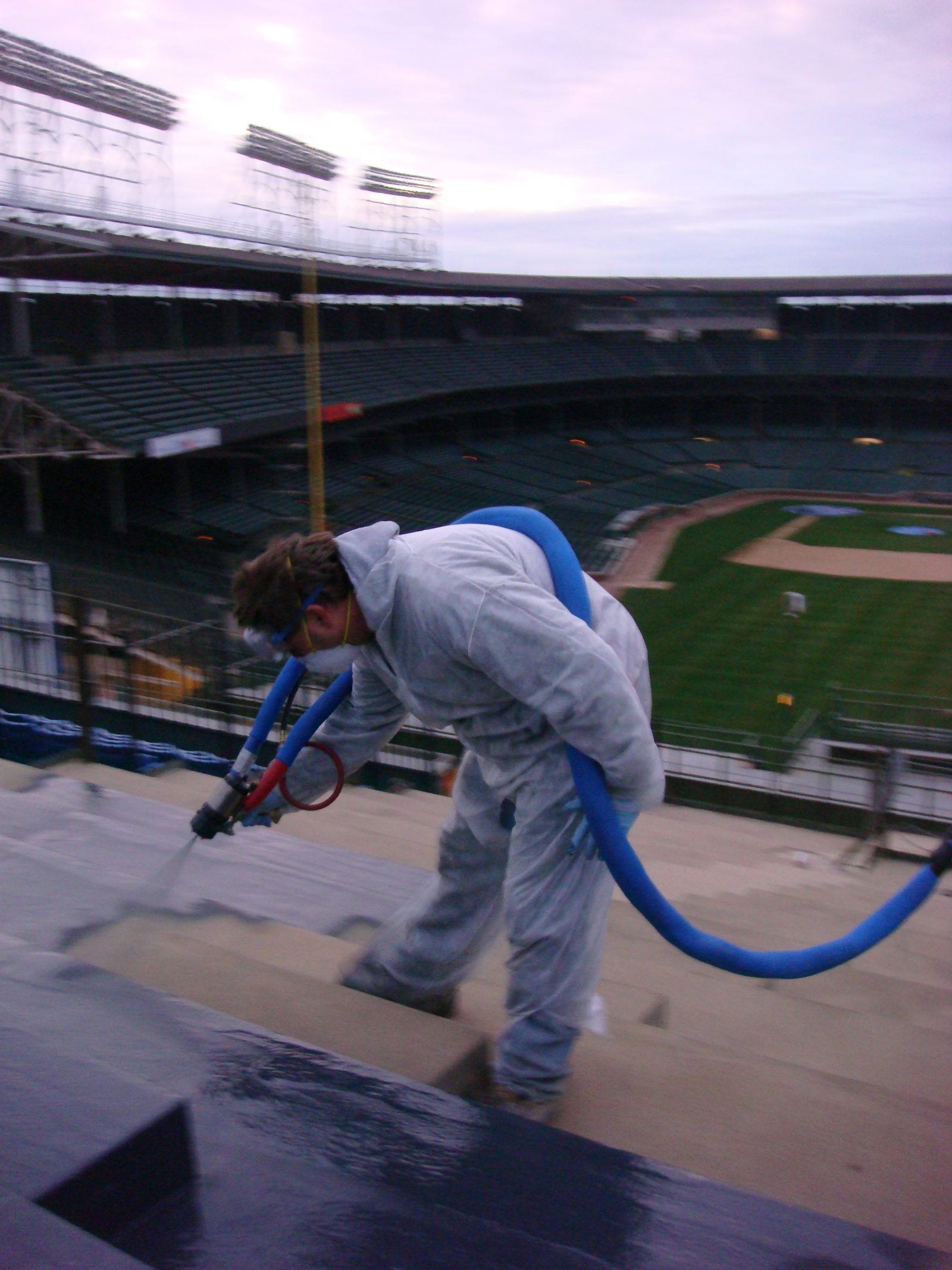 Garage floor coating system installed over a prepared slab